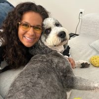 Charlotte's Animal Care dog sitting with grey and white dog in Greenville, SC